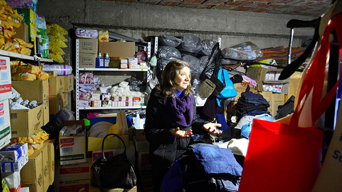 Lenče Zdravkin turned the ground floor of her house into a storeroom for humanitarian aid handed to passing refugees and migrants. Photo by Viktor Popovski/IKS, CC BY-NC-ND 3.0