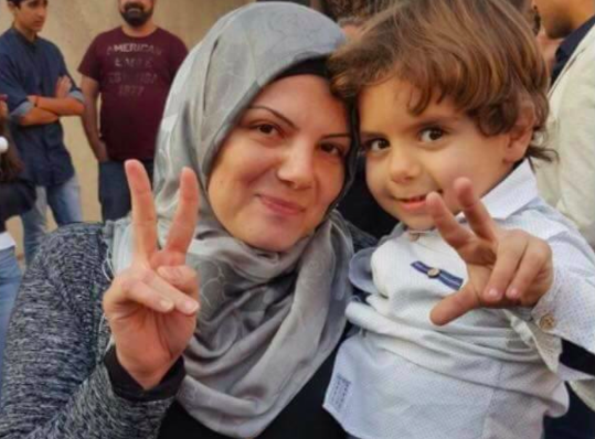 Fatima and her son Ali. Photo by 'Protecting Lebanese Women' on Facebook.