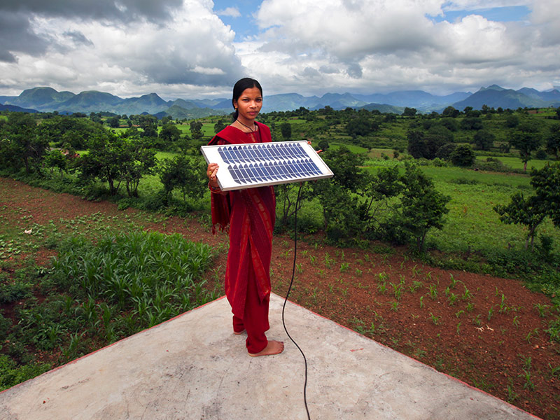 Meenakshi Dewan brings something very special to her home in Orissa, India: electricity. Photo by Flickr user DFID - UK Department for International Development. CC-BY-NC-SA 2.0