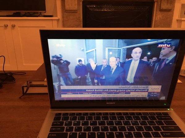 "Hell is freezing over," quips Anthony Elghossain as he watches the Ooun-Geagea agreement playing out on his computer. Photograph shared on Twitter. 