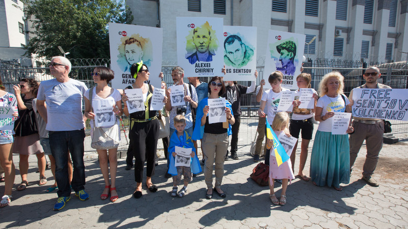 Protesters outside the Russian embassy in Kiev demand the release of Oleg Sentsov and Aleksander Kolchenko on August 25, 2015. Photo by Inna Sokolovska from Demotix.