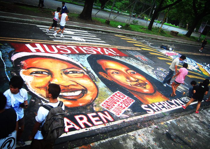 A street inside a university was painted with the faces of two student leaders abducted in 2006 by suspected military agents. The students were campaigning for land reform during that time. An army officer is currently facing trial in connection to the case. The two students are still missing. Image from the Facebook page of Ang Gerilya