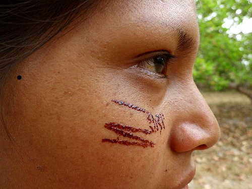 Symbols used as marking during traditional activities and during communal work. It can also be used as protection from bad spirits. Photo by Wadaana. 