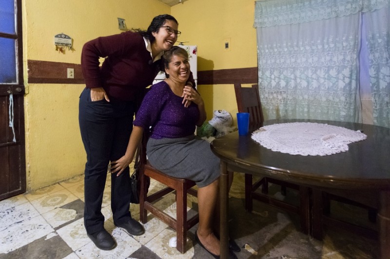 Before she leaves, Arlet's mother, Martha Flores Ibarra, arrives home at 6:30 am after working at one of the transnational maquiladora factories located in Ciudad Juarez. Credit: Miguel Gutierrez Jr./KUT News. Used with permission.