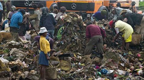 Malagasy citizens going through trash pile ups in Antananarivo via koolsaina