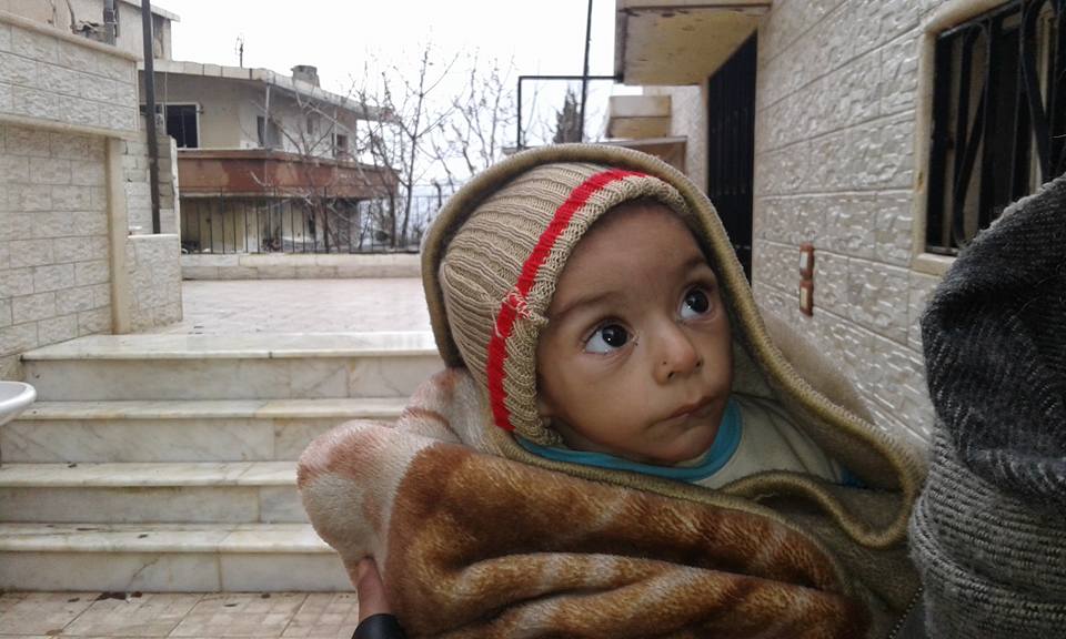 A Syrian child from Madaya, besieged for the past six months. Photo credit: Madaya page on Facebook 