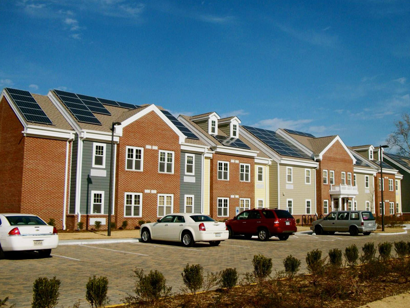 Virginia Supportive Housing's South Bay Apartments provide sixty supportive studio apartments for formerly homeless single adults in Portsmouth, Virginia. VSH installed the 28.29kW solar array to reduce their long term operating costs and display their commitment to responsible building practices. Photo by Flickr user Urban Grid. CC-BY-NC-SA 2.0 