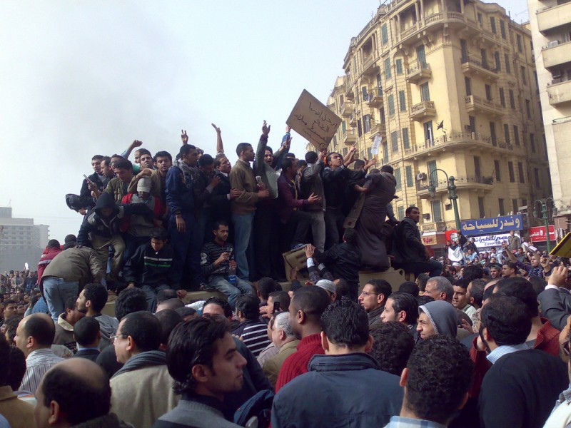 Demonstrators atop an army truck in Tahrir Square in Cairo, January 2011. Photo by Ramy Raoof via Wikimedia (CC BY 2.0)