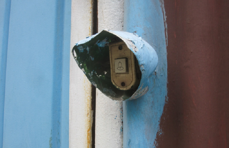 Doorbells on houses in Almaty are sheltered from the elements by cut-off plastic bottles. 