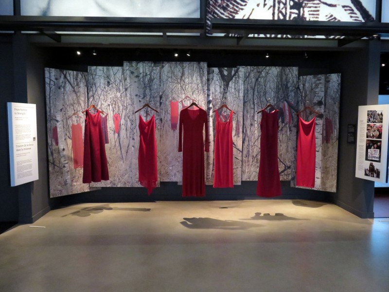 REDress Project installation: At the Canadian Museum of Human Rights; a response to over 1000 missing and murdered aboriginal women. Photo by Flicker user Sean_Marshall. CC BY-NC 2.0