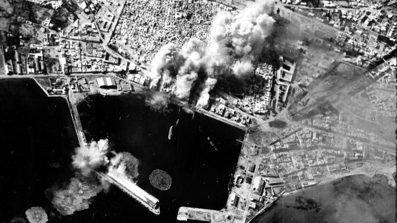 Port of Sousse under attack by US Air Force, 1943. Photo from US Library of Congress, released to public domain.