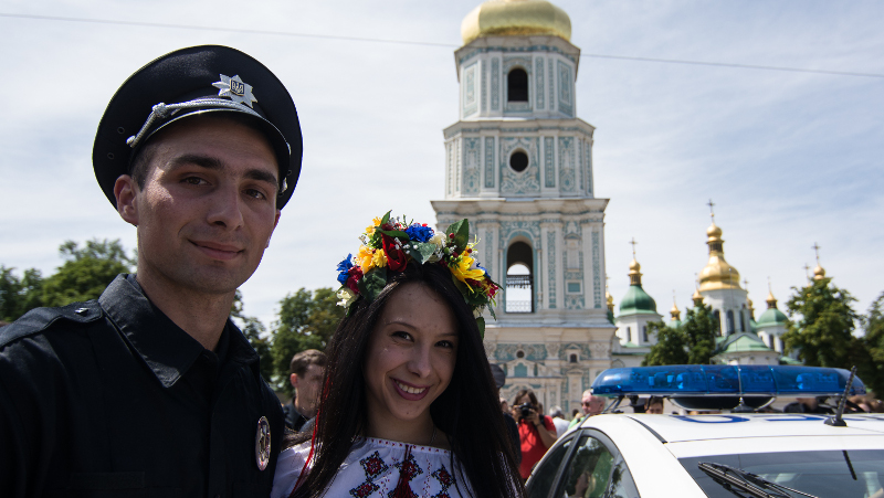 Relatives and friends came to Sofievskaya square to greet the new patrol police officers taking the oath of allegiance. Photo by Stanislav Yandulsky from Demotix.
