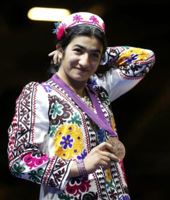 Mavzuna Chorieva during the awarding ceremony wore Tajik national clothe. The picture is taken from girlboxing.org 