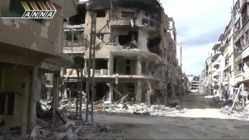 A television screenshot Hassan took of his home street in Syria. Hassan lived in a suburb of Damascus called Darayya, the site of intense fighting between the Syrian regime and rebel forces. (Hassan Jamous)
