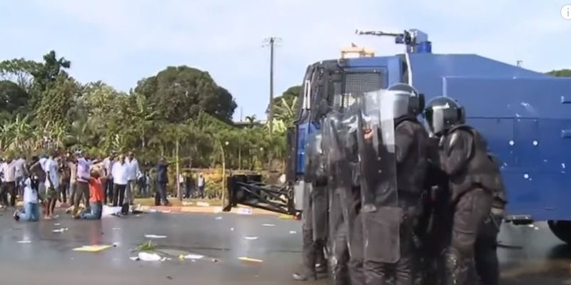 Screen capture of video of conflict between police and protesters after the elections via France 24 