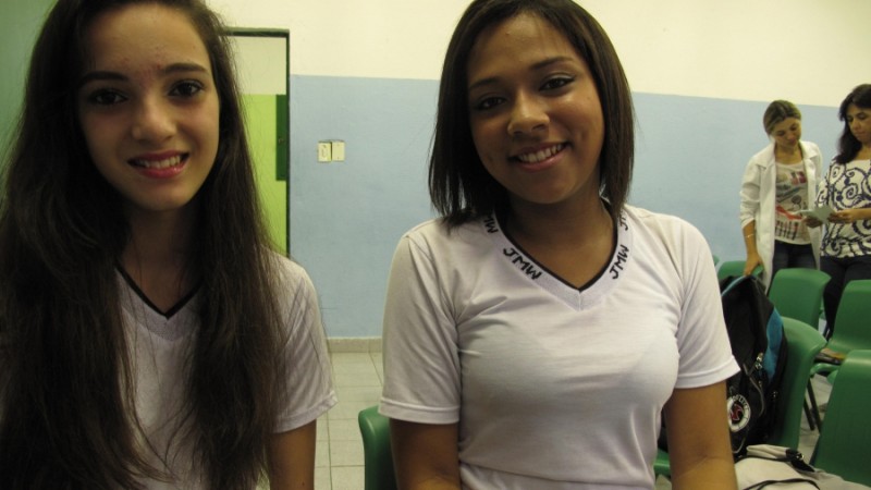 Sarah Campos (left) and Juliana Santos, former students of the Leão Machado School. Campos says she tried her first radish after working in the school garden. Now she loves them. Credit: Rhitu Chatterjee. Used with PRI's permission