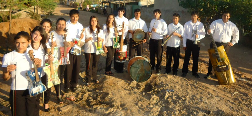 Paraguayan music students show their instruments made out of trash. Photo shared on Facebook by Landfill Harmonic