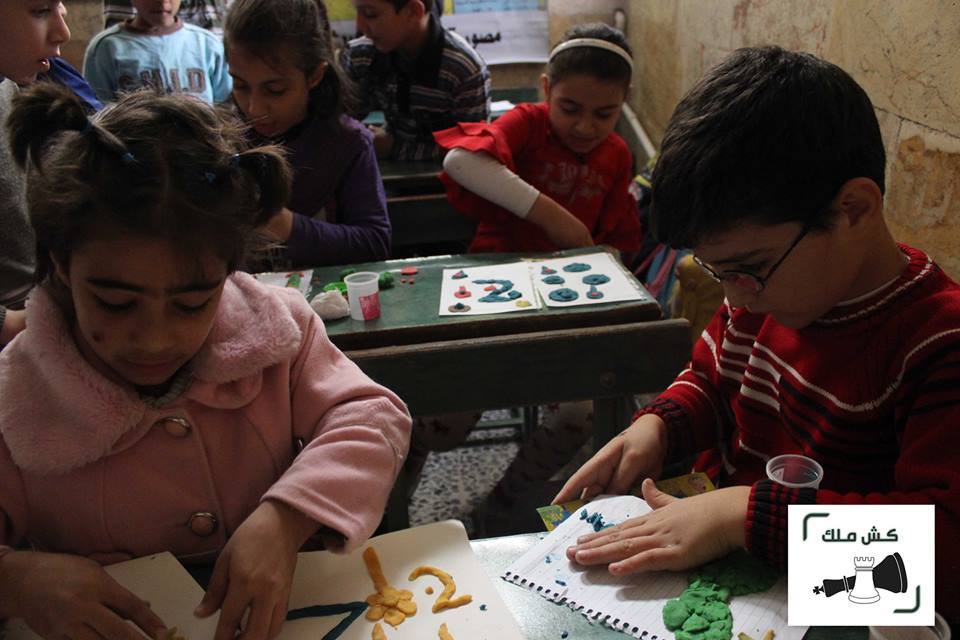Children during of the Kesh Malek projects in Aleppo, Syria. Source: Kesh Malek's website.