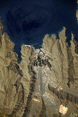 An airport in a valley facing the sea