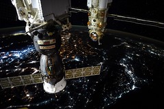 Soyuz and Nauka over night-time Earth