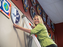Hanging the Expedition 51 patch at NASA mission control