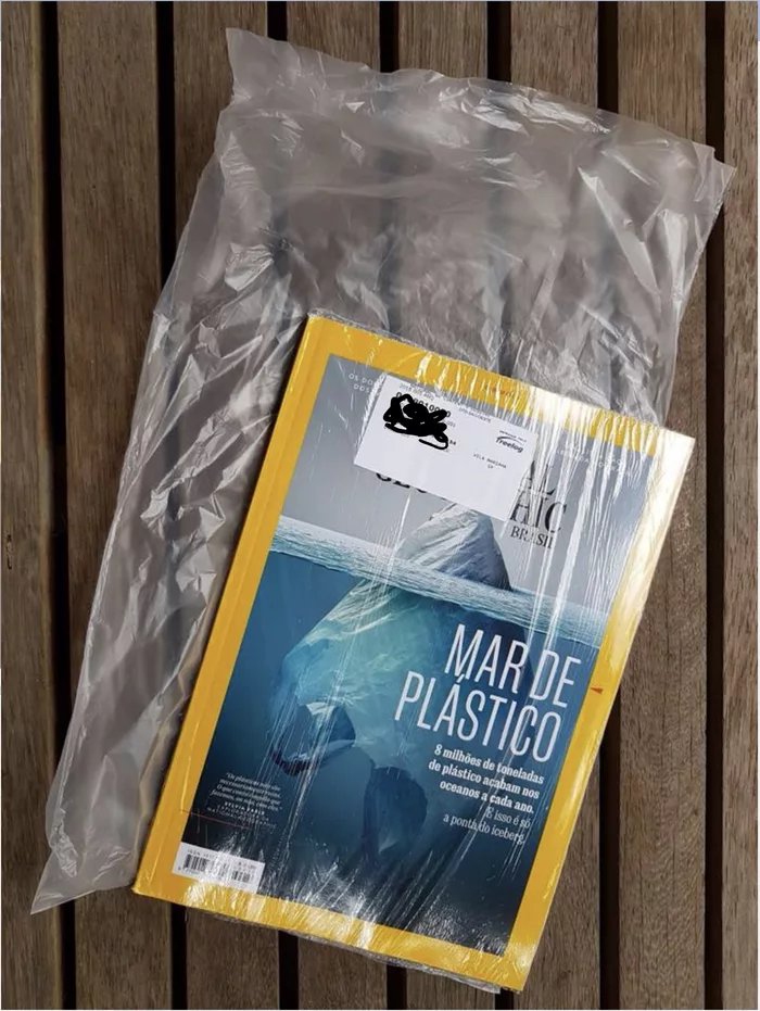 National-Geographic-magazine-that-warns-about-danger-of-plastic-bags-comes-inside-a-plastic-bag-that-is-inside-a-plastic-bag.jpg